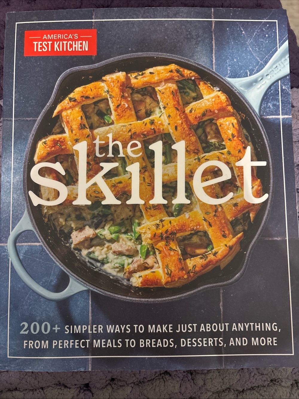 The Skillet Cookbook by America’s Test Kitchen — Blue Cover